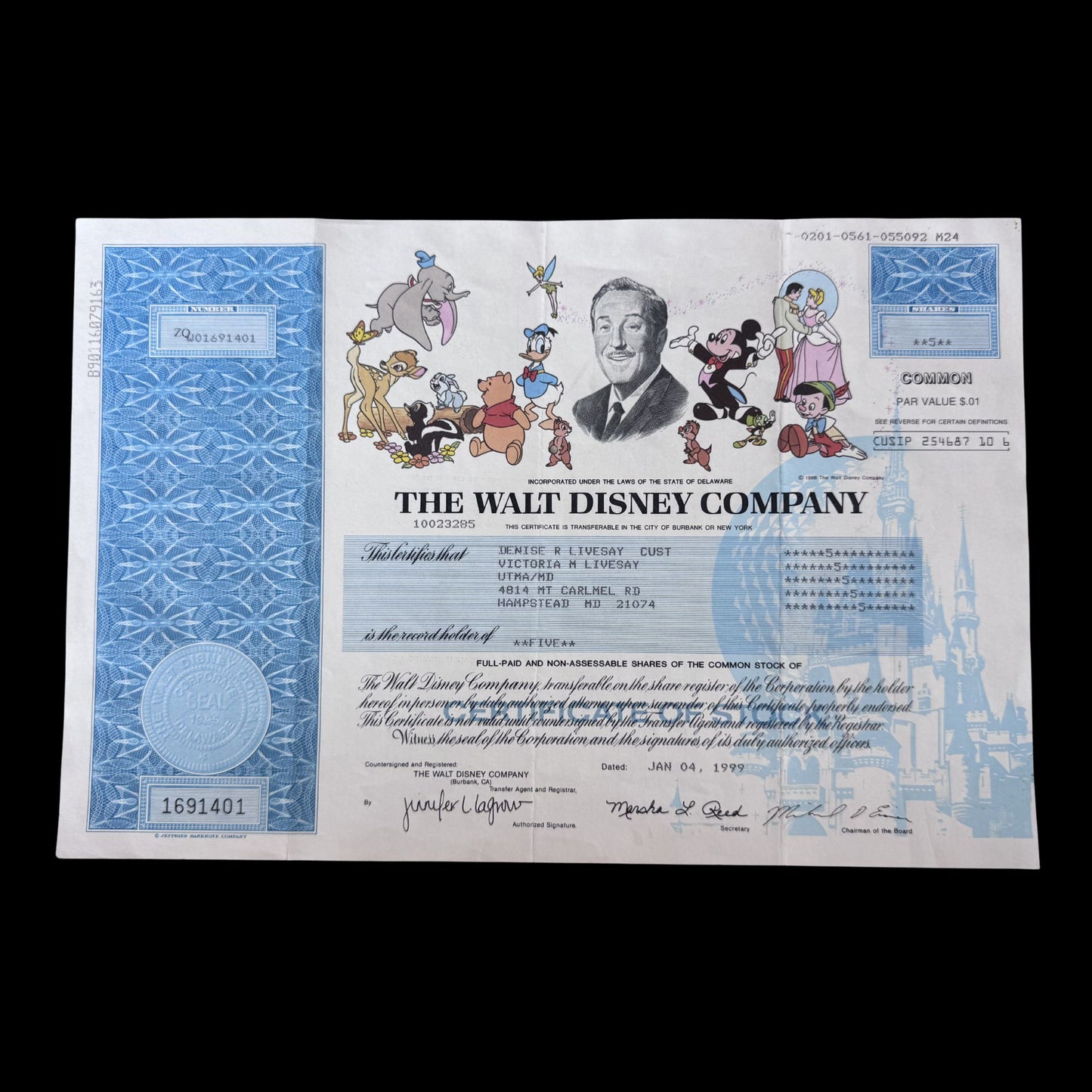 The Walt Disney Company Stock Certificate from 1990s with Mickey Mouse and friends