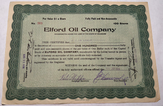 This green stock certificate from Elford Oil Company, issued in 1919, features a raised seal, handwriting, and stamps, signifying its authenticity and historical value. The certificate represents a share in the Elford Oil Company, which was part of the burgeoning oil industry during the early 20th century.