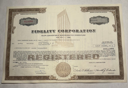 Fidelity Corporation Bond Certificate, brown w vignette of their offices. bond due may 1988. issues in 1974. cancellation holes and stamps present