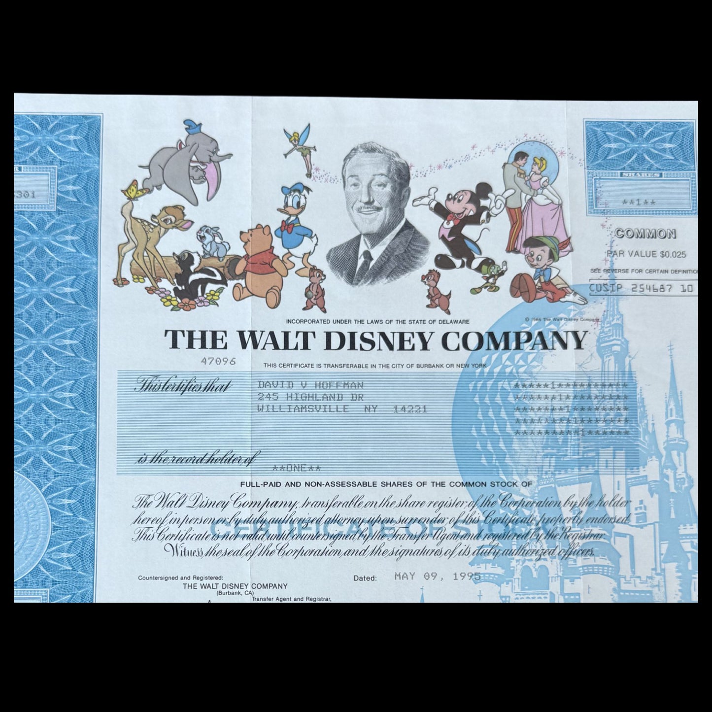 The Walt Disney Company Stock Certificate from 1990s with Mickey Mouse and friends